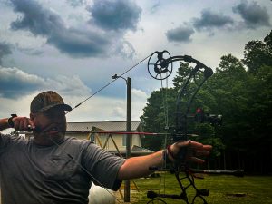 - North American Bow Hunter Author testing out different wrist releases
